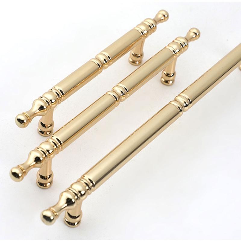 Skříňkové úchytky se zlatou povrchovou úpravou Ergonomický design Hardware odolný proti korozi Jednoduchá instalace Pro kuchyňské skříňky Komody