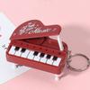 Chaveiro Mini Piano de Mesa Fofa Máquina de Jogo Musical Pingente Colorido para Bolsa Brinquedo Educativo Infantil Presente de Páscoa