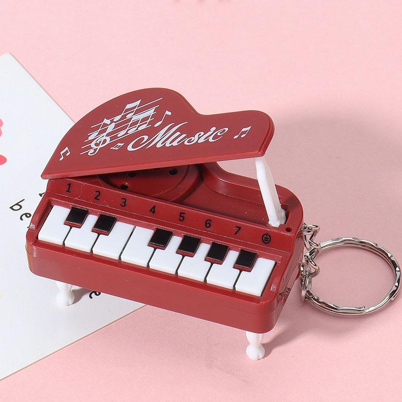 Chaveiro Mini Piano de Mesa Fofa Máquina de Jogo Musical Pingente Colorido para Bolsa Brinquedo Educativo Infantil Presente de Páscoa