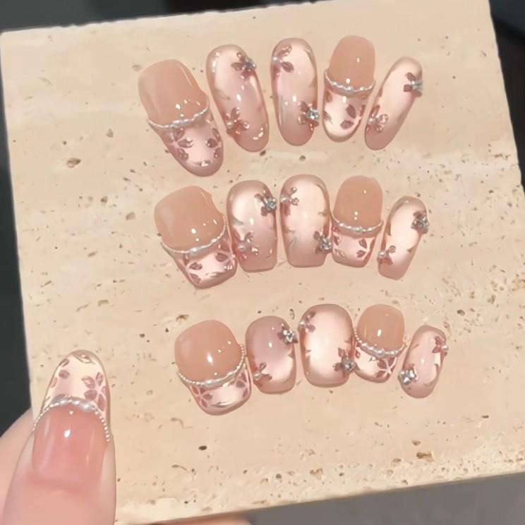 Xiaohongshu Cat-Eye Floral Nails: Elegant, High-End, Whitening, Handmade, Wearable Collection.