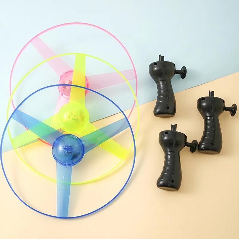Lichtgevende Vliegende Schotel Speelgoed met Trekkoord - LED Verlichte Schijf Helikopter Lanceerder voor Plezier Buiten - Draaiend Vliegend Speelgoed voor Kinderen Cadeau