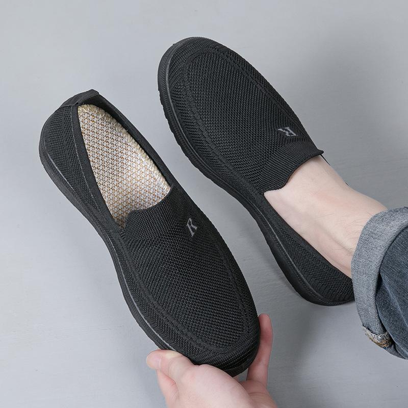 Sapatos casuais masculinos de primavera e verão novos de um pedal preguiçosos respiráveis antiderrapantes sapatos masculinos respiráveis tecidos com mosca