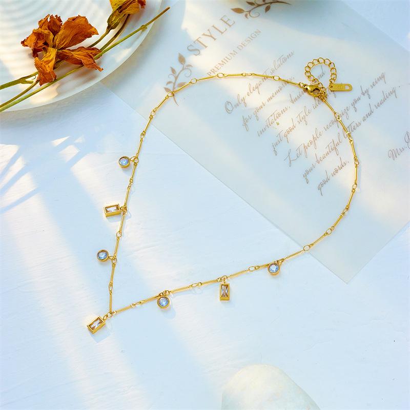 Luxury Gold-Tone Titanium Steel Necklace with Baguette-Cut Clear Crystals & Round Rhinestones – Elegant Dangle Chain Design