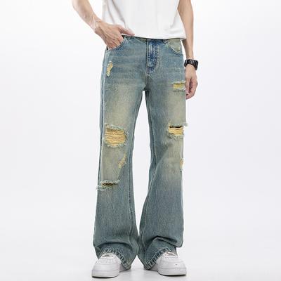 Neue Herren-Jeans mit Rissen für den Frühling, lockeres Design mit leicht ausgestelltem Bein