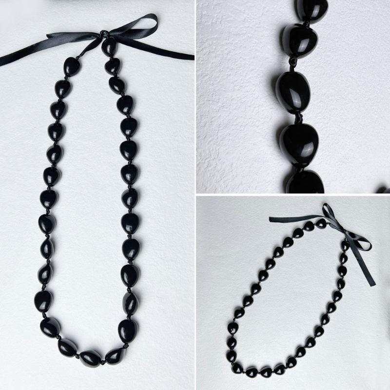 Collana di noci di kukui - Laurea Classe 2023 - Ghirlanda di noci con perline nere e fiocco - Regalo di laurea - Accessorio per feste