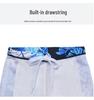 Korean Style Boys' Dinosaur Long-Sleeve Two-Piece Swimsuit with Sun Protection, Quick-Drying, for Older Children.