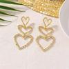 Versatile European & American Heart Drop Earrings - Slimming, Irregular Design, Hollow Heart Shape