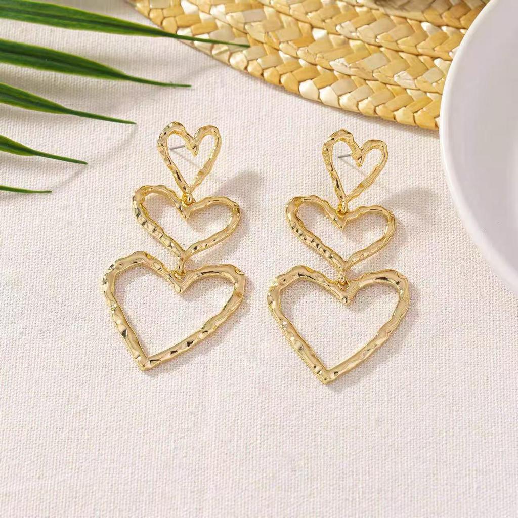 Versatile European & American Heart Drop Earrings - Slimming, Irregular Design, Hollow Heart Shape
