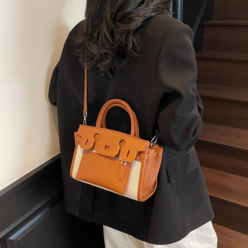 High-end contrasting color small bag women's new versatile messenger bag fashion handbag commuter bucket bag