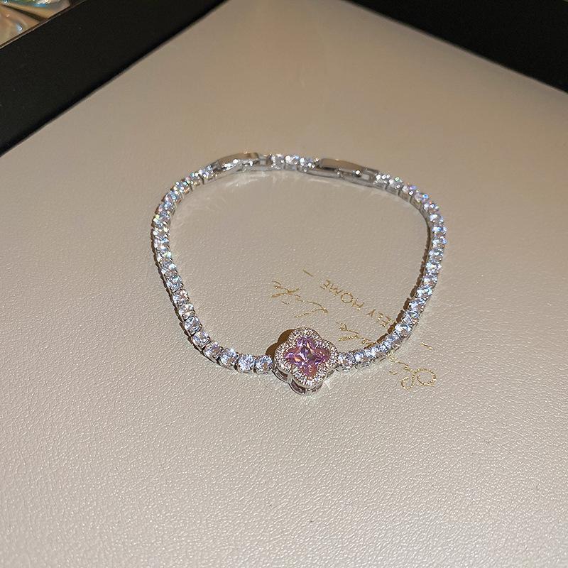 Pink Diamond Zirconia Starburst Flower Bracelet: Trendy, Luxurious Jewelry with Unique Design.