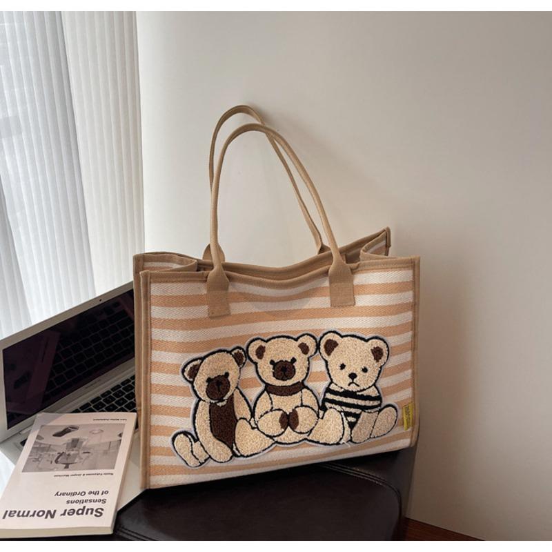Striped canvas bag women's large-capacity new autumn and winter versatile cartoon shoulder bag college student tote bag