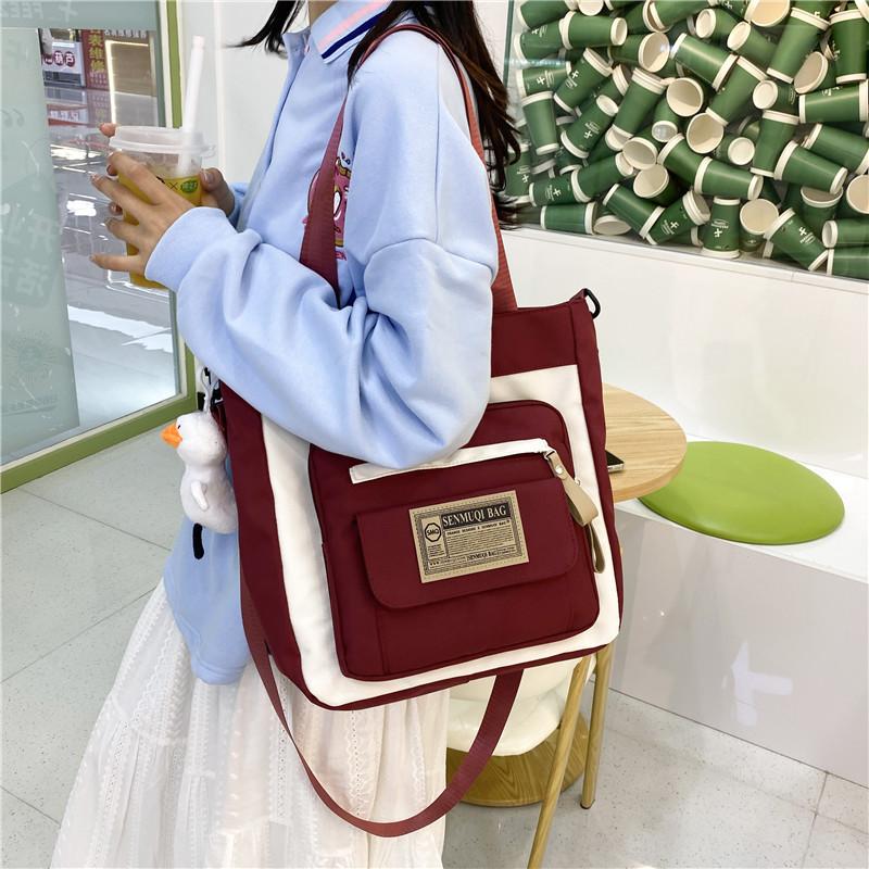Canvas bag new large-capacity make-up bag dual-purpose tote bag women's schoolbag students junior high school high school canvas messenger bag