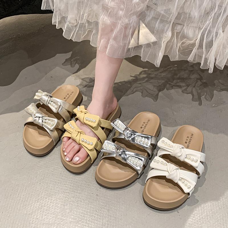 Gentle bow beautiful cool slippers women's summer wear 2025 new with skirt beach soft flat bottom one-word slippers