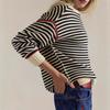 European and American striped color matching knitted sweater 1011 new women's loose design sense contrasting color personalized sweater