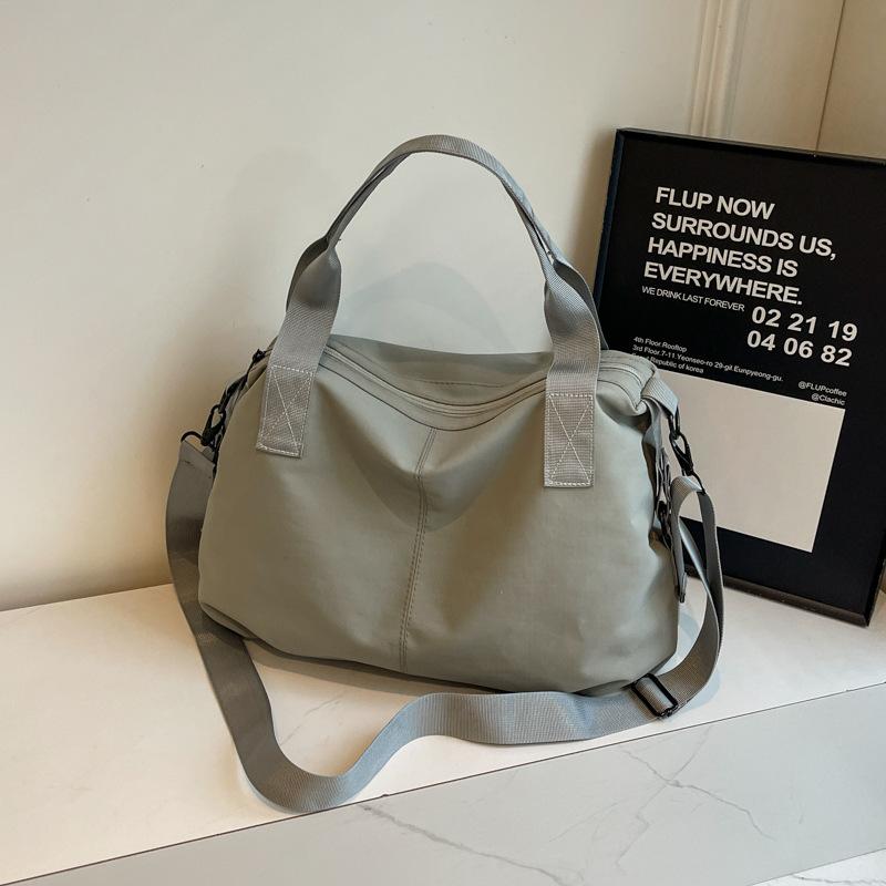 Handheld cloth bag women's bag with high texture and large capacity shoulder messenger bag, lazy and romantic to go to work, storage large bag