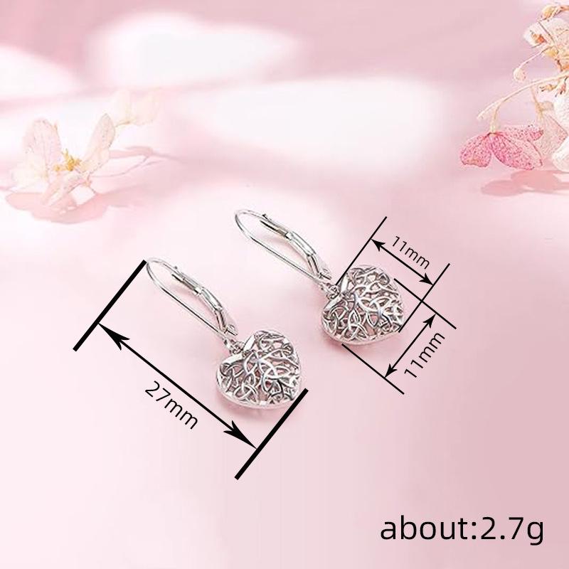 Heart-Shaped Hollow Earrings: Stylish European & American Daily Jewelry for Women