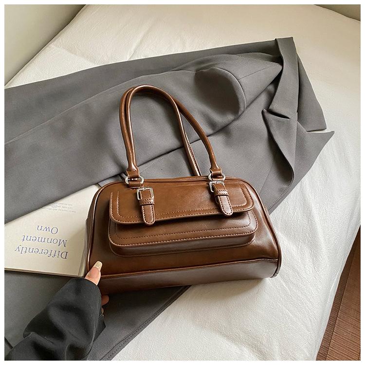 Eine modische, schlichte und elegante, Nischen-Casual-Einzelschultertasche für Damen, eine koreanische Version der beliebten Pillow Bag