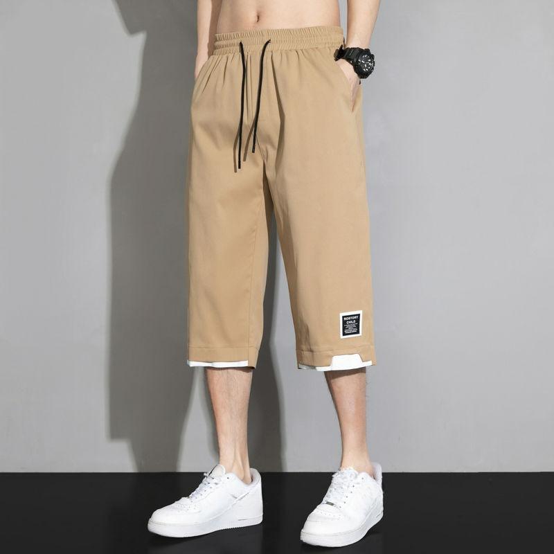 

Летние мужские универсальные повседневные шорты, модные мешковатые брюки с эластичной резинкой на талии цвета хаки, черные, зеленые, большие размеры, новые капри 8XL