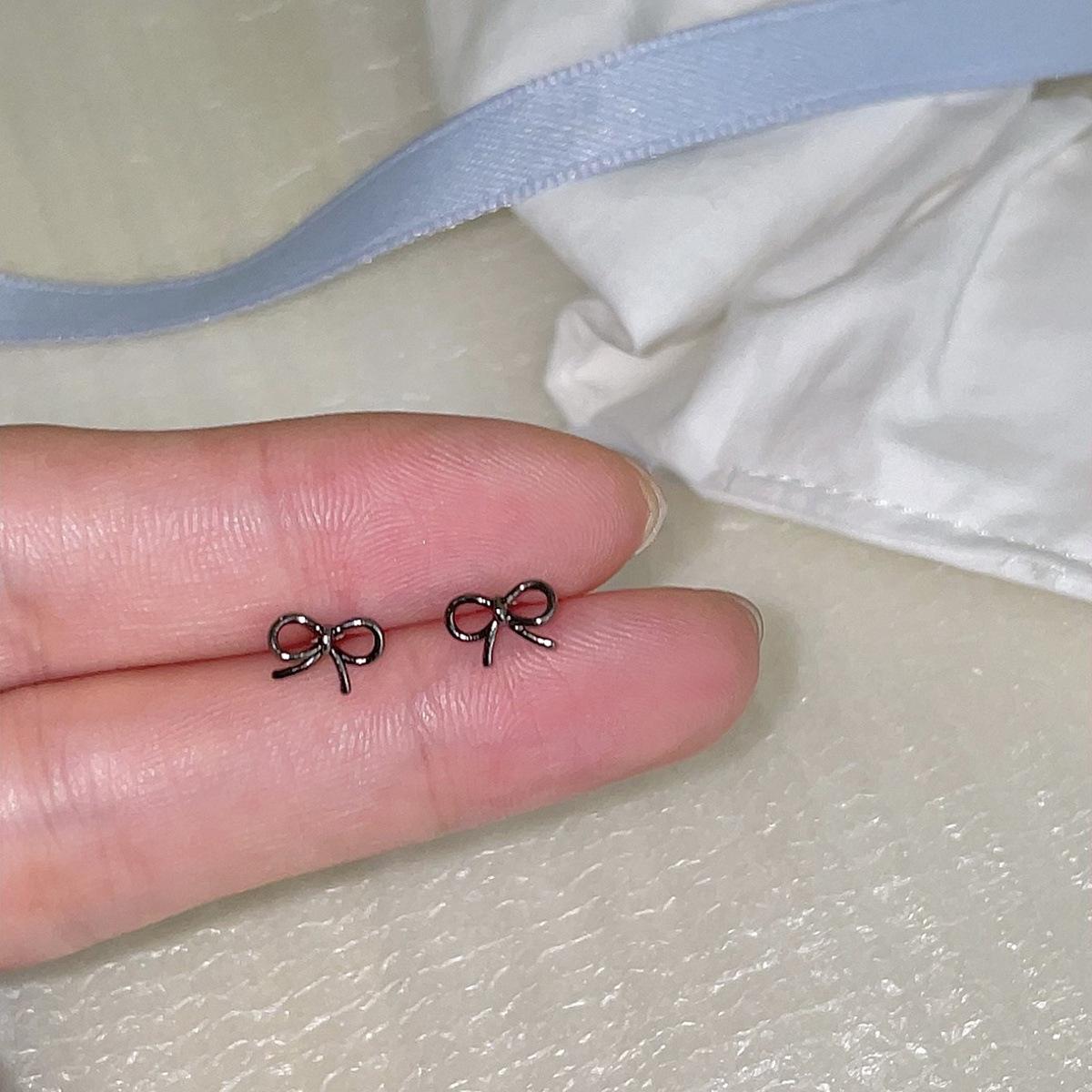 

925 silver needle zircon stud earrings women s unique personality sweet and cool style bow earrings light luxury high-end new earrings 925 silver needle