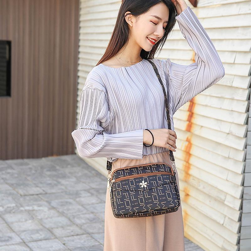Small bag, old flower bag, new large-capacity women's oblique span bag, shoulder bag, six-layer mobile phone bag.