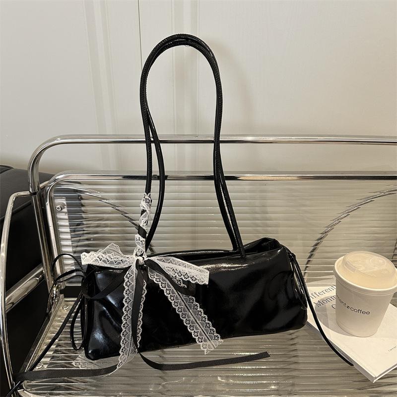 Korean version of simple ins baguette bag women's 2025 new trendy versatile commuter shoulder bag casual bow armpit bag