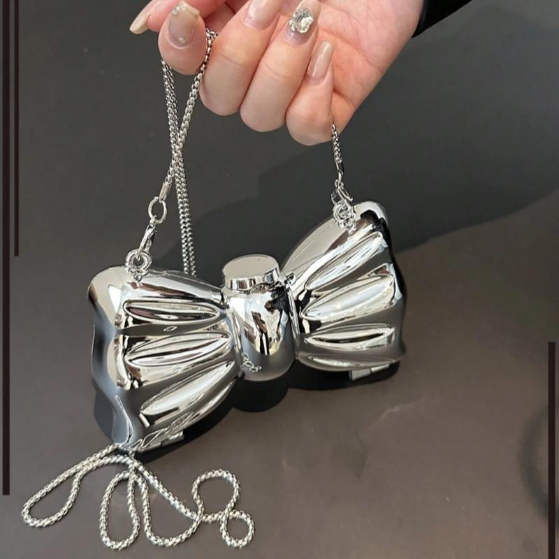 Mini Galvanisiert Silber Metall Glänzend Schleife Clutch Tasche Damen Personalisierte Mode Kette Kosmetik Crossbody Tasche Münzbeutel