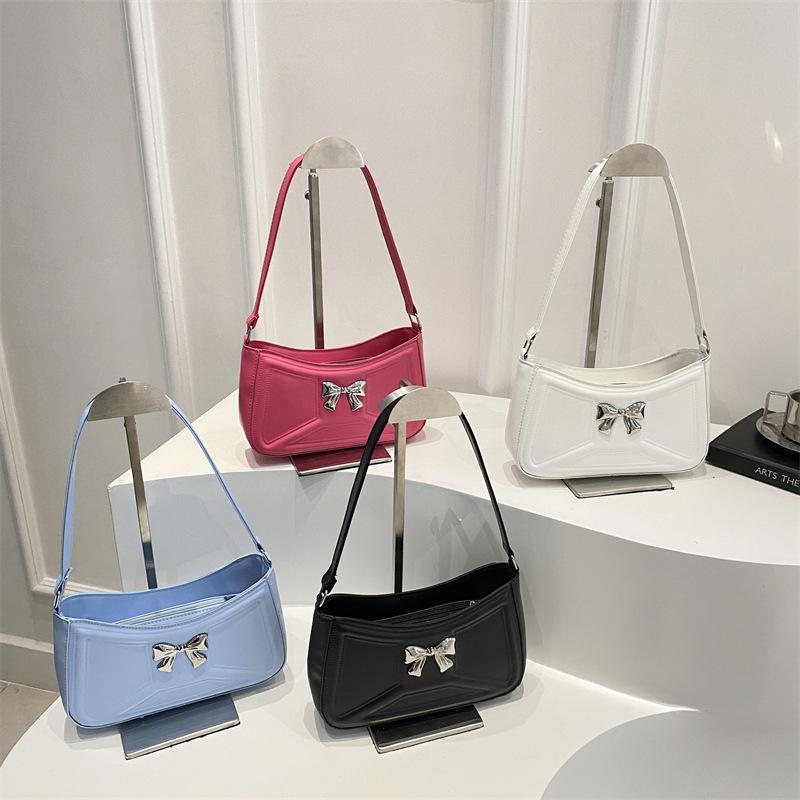 22 Spring New Textured Bow Tide Indentation Fresh Stylish Simple Underarm Shoulder Bag