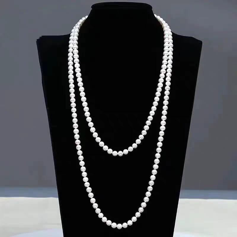 Elegant Retro Pearl Double-Layer Necklace: Small Fragrance Style, Versatile for Sweaters, Perfect Cross-Border Accessory for Women.