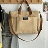 Borsa tote portatile per studentesse urbane minimaliste, grande capacità, pendolarismo, tela orizzontale, spalla singola, croce diagonale