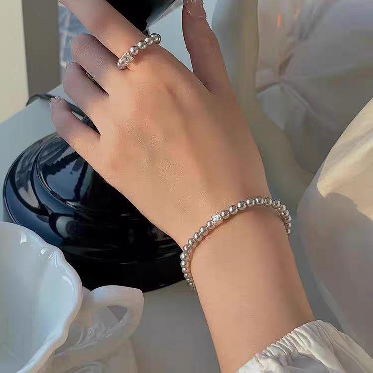 Shijia pärla zirkon elastiskt armband dam högklassig känsla enkelt sockerbitarmband temperament lätt lyx och elegant