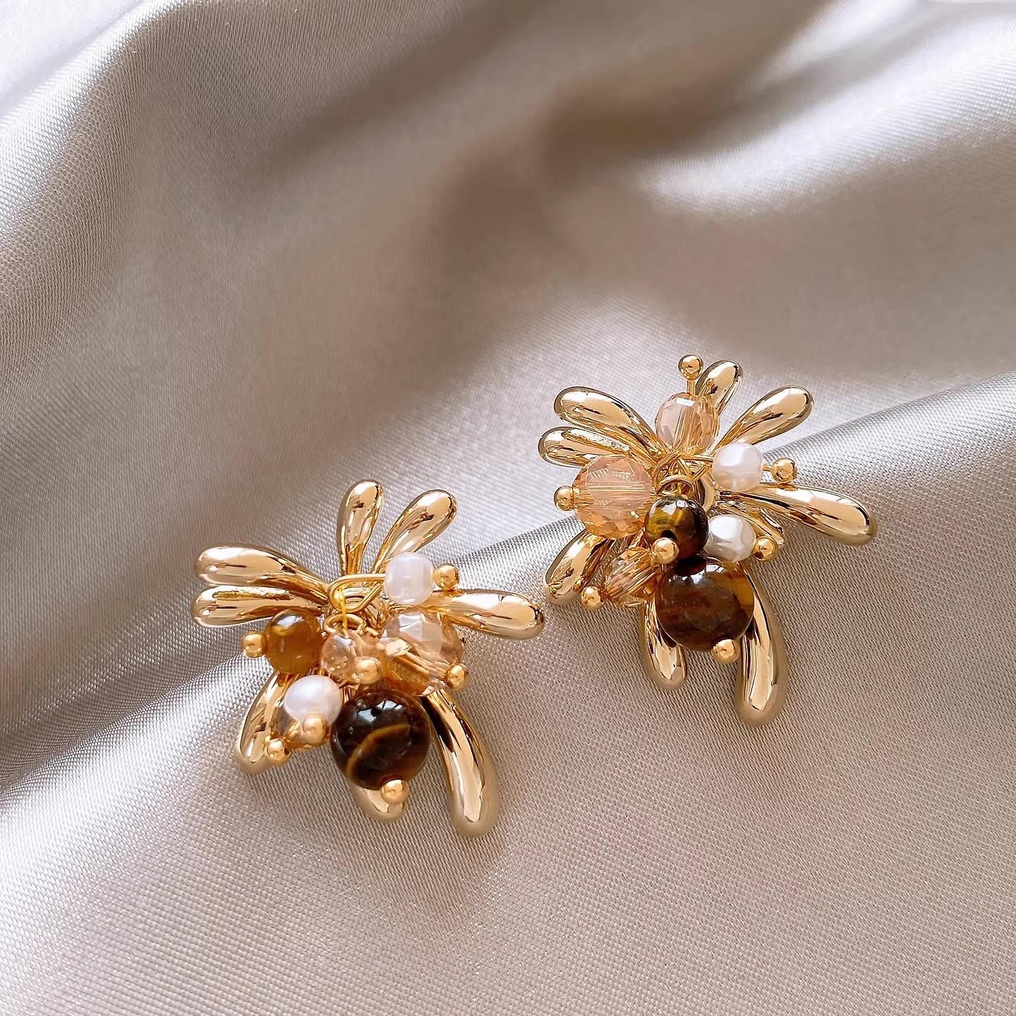 

Maillard golden fireworks stud earrings explosive earrings unique autumn and winter ear jewelry