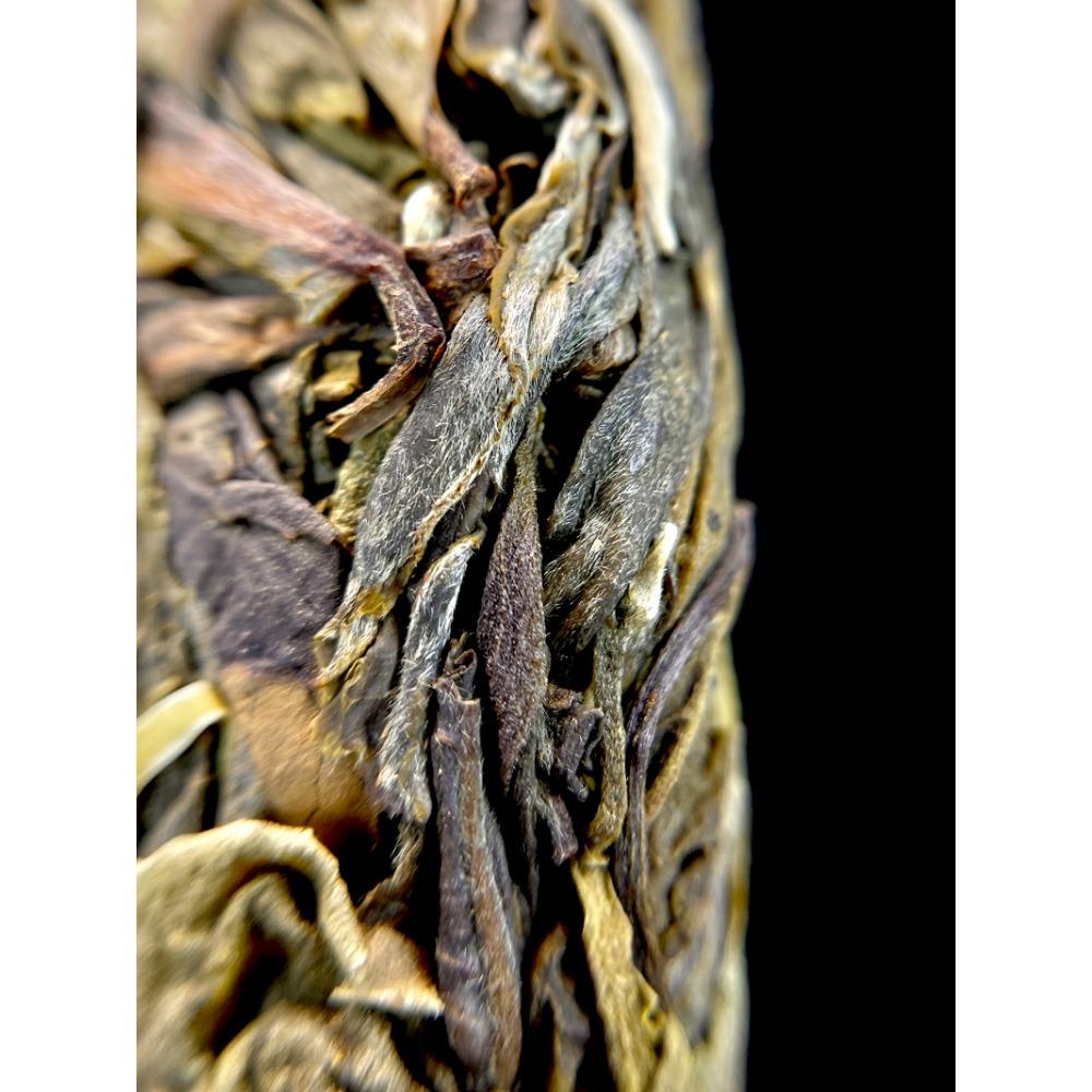 357g Yunnan Pu'er Teekuchen sieben Samen Kuchentee Island Blattgold reiner roher Tee