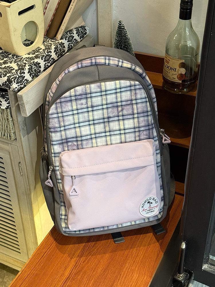 Large-capacity contrasting color plaid junior high school backpack, new student commuting light schoolbag, versatile computer backpack