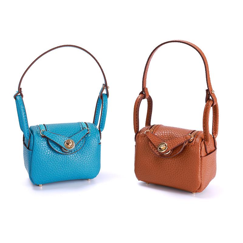 Geantă Mini de Modă pentru Femei: Breloc auto cu căști drăguțe și pandantiv plic roșu