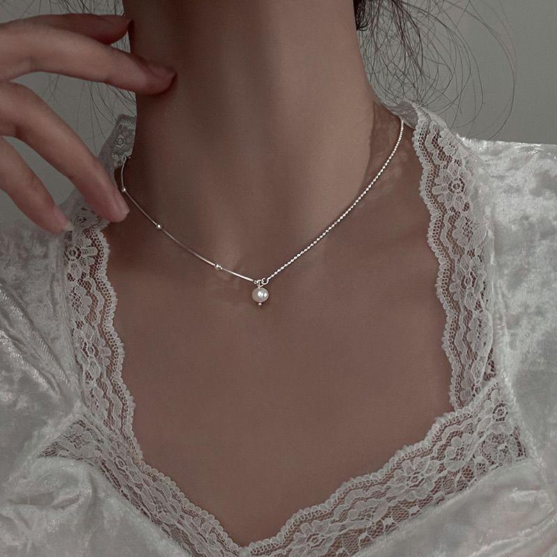 Korean Pearl Necklace: High-End Silver Clavicle Chain with Niche Design, Perfect for Light Luxury and Sweater Pendants.