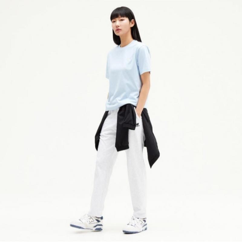 New Balance Tee Kqj Nbnee21013 51 Common Essential Small Logo Short Sleeve Tee  Stan