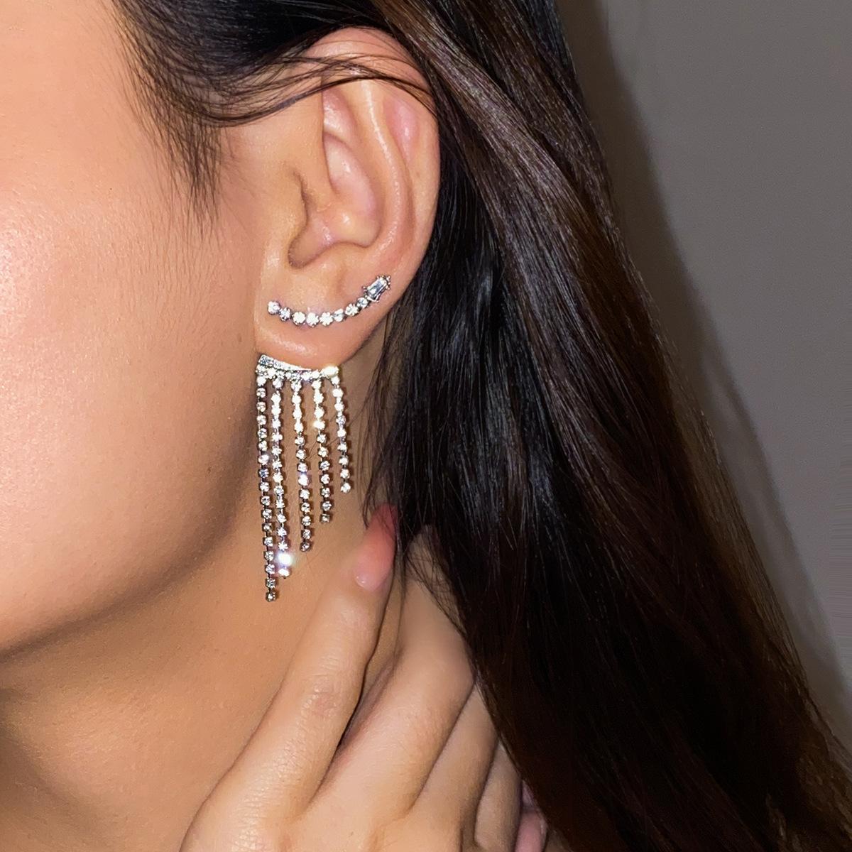 

Light luxury party full of diamond temperament stud earrings female ins exaggerated simple versatile long New Year s earrings See details