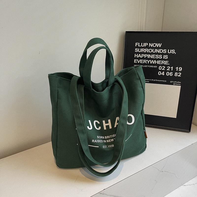 

Canvas bag women s shoulder lazy wind literary Japanese and Korean ins simple large-capacity letters student class autumn bag зелений
