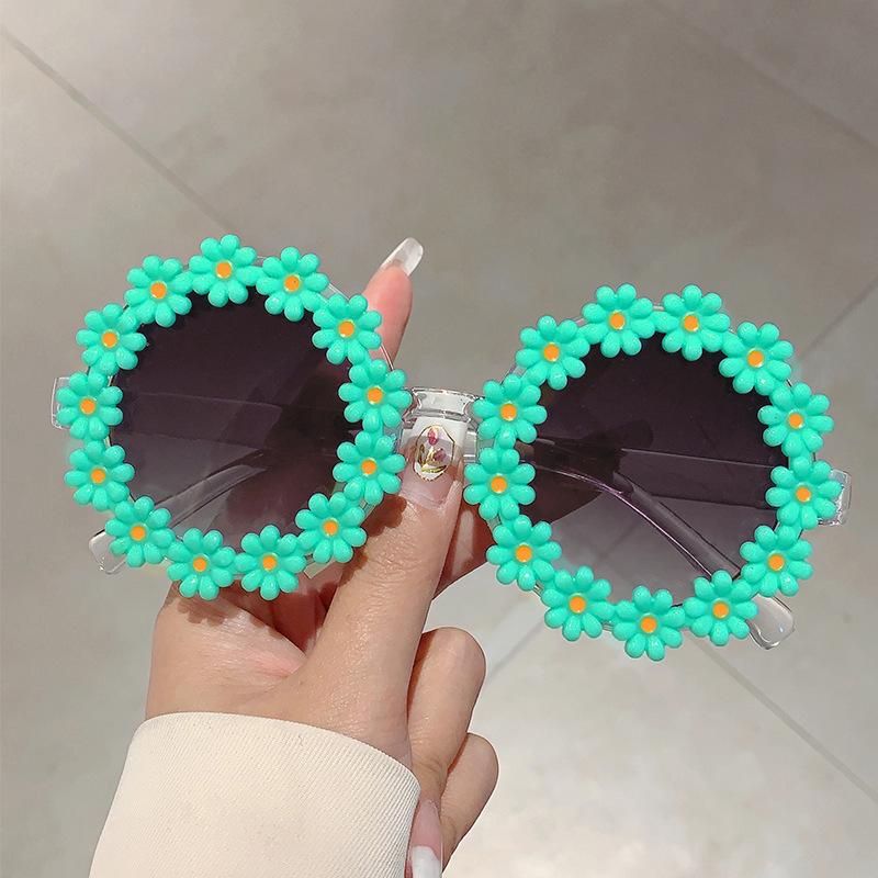 Lunettes de soleil pour enfants mignonnes tendance forme de fleur petite marguerite décontractées polyvalentes vacances à la mer lunettes de soleil pour bébé