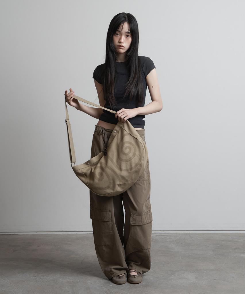 Peanut Loop Spiral Canvas Cross Bag Beige