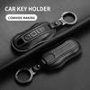 Etui na kluczyk samochodowy Pokrowiec Shell dla Porsche 718 Cayenne Panamera 911 Macan Taycan Cayman Boxster Skóra licowa Akcesoria do kluczyków samochodowych
