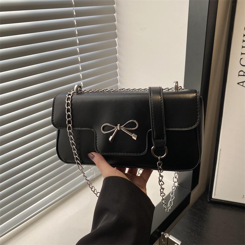 

French new retro bow fashion small square bag women s solid color oily leather large capacity commuter temperament messenger bag чёрный