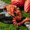 Egg and Figurine Set Handcrafted Collectible with Unique Color Shifting Scales