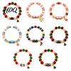 Red And Green Beaded Bracelets Christmas Bracelet with Alloy Tree Charm Santa Deer Stocking Center Bead for Women Elastic Bracelet Festive Jewelry