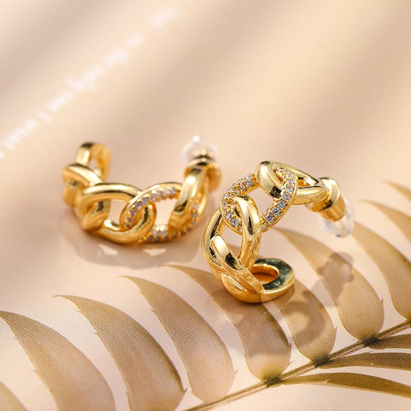 925 Gold-Plated Zircon Twist Hoop Earrings: Elegant, Versatile, and Atmospheric Design