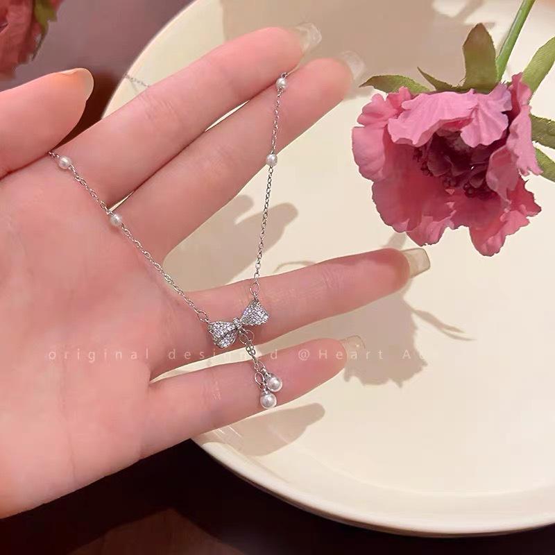 2024 High-End Pearl Bow Tassel Necklace - Elegant Luxury Clavicle Chain for Women