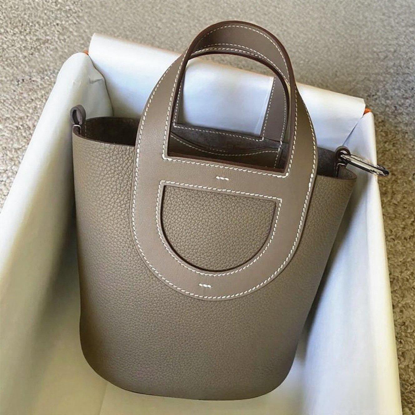 

Розкішна жіноча сумка-відро зі шкіри корови