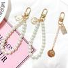 Vintage Metal Keychain Pearl Bracelet Small Gift Letter Small Pendant Ins Pearl Key Chain Gift