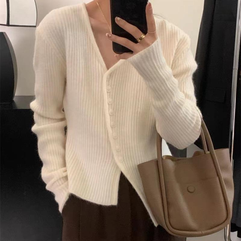 Design sense irregular knitted cardigan top women's autumn and winter new temperament commuting thin inner sweater
