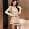 Preppy Two-Piece Knit Cardigan & Pleated Skirt Set with Polo Collar